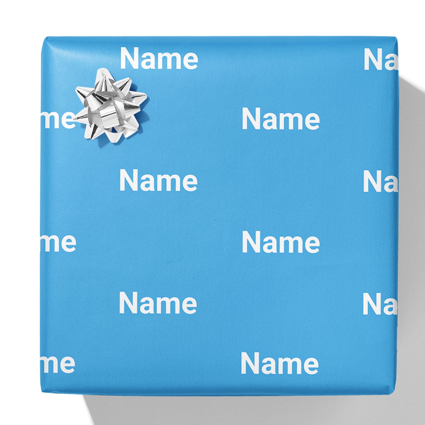 Geschenkpapier mit Namen in Blockfarbe