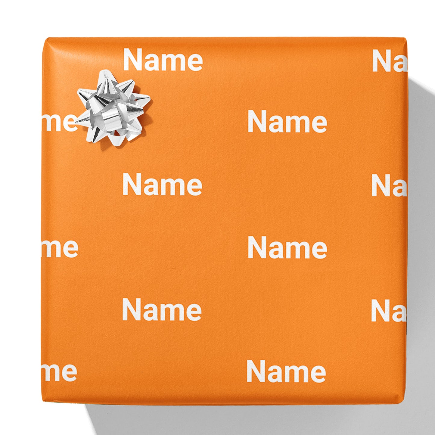 Geschenkpapier mit Namen in Blockfarbe
