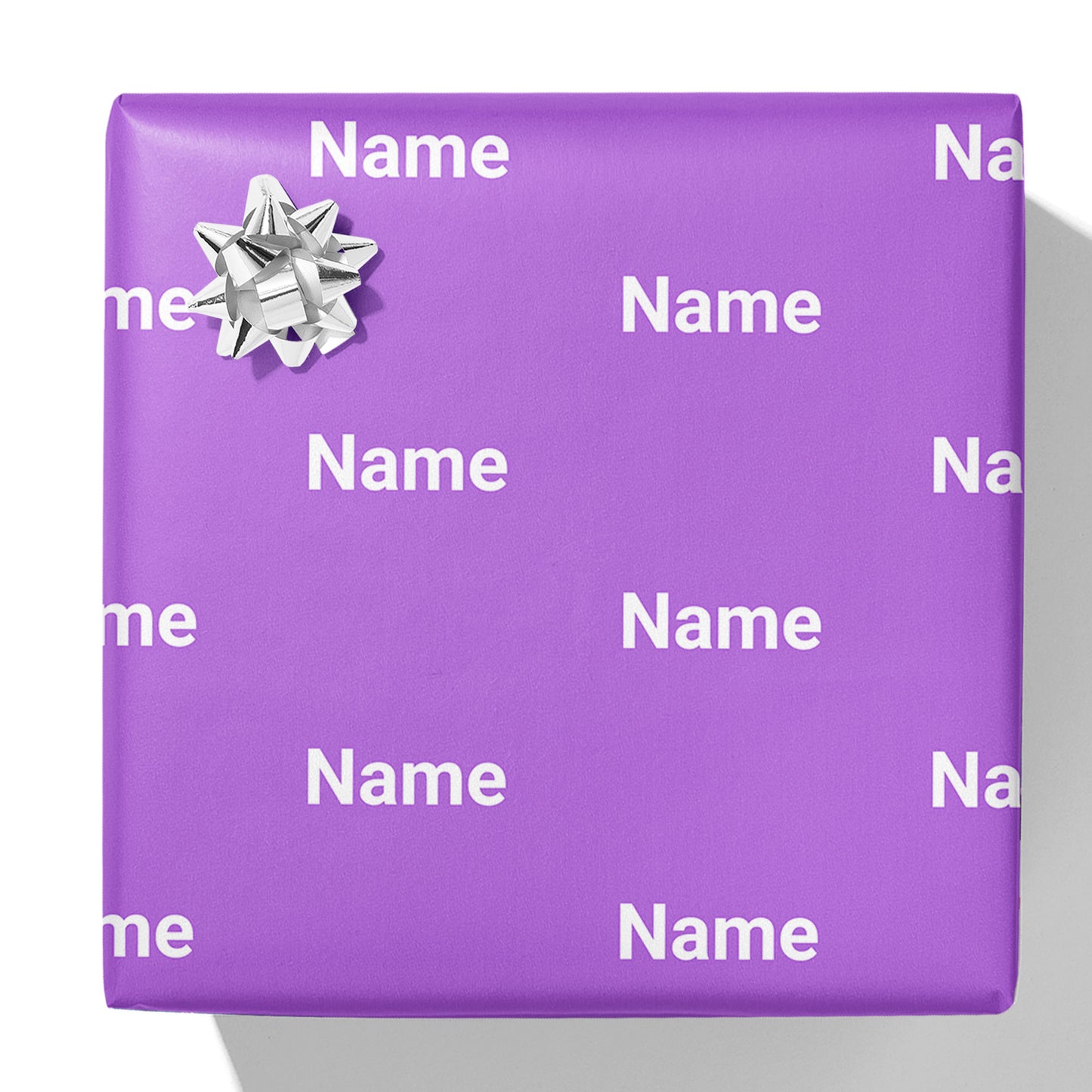 Geschenkpapier mit Namen in Blockfarbe